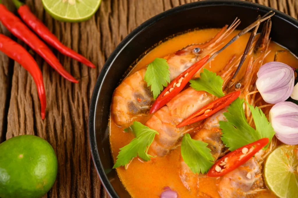 Tom Yum Soup with chilies and herbs