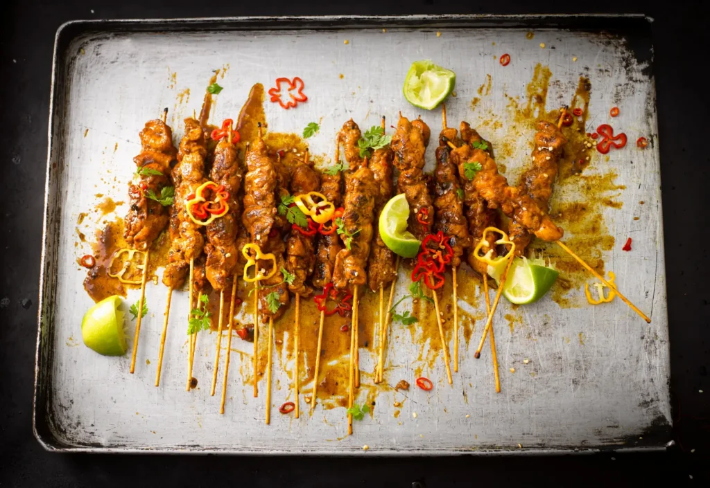 Savory Chicken Satay Skewers with Lime Garnish