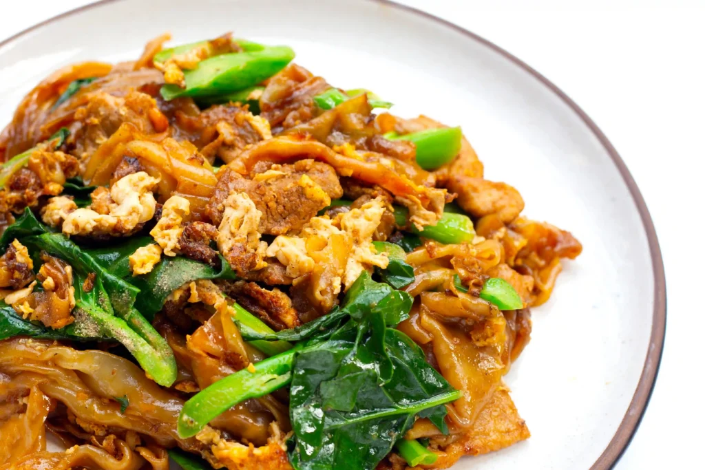 Pad See Ew noodles with chicken and vegetables