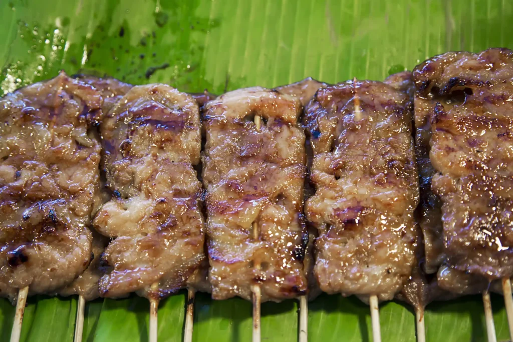 Grilled Pork Skewers on a Green Banana Leaf