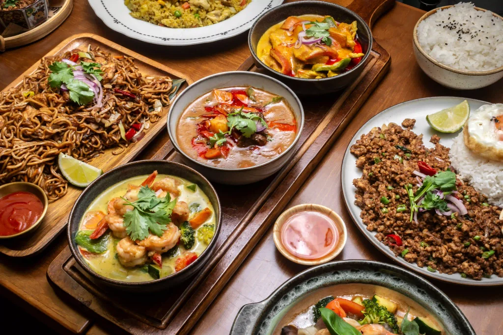 Different varieties of Thai curry including red, green, and yellow curry
