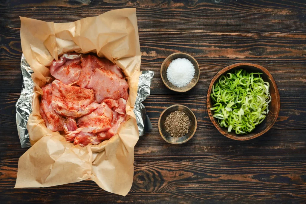 Marinating pork neck for Kor Moo Yang
