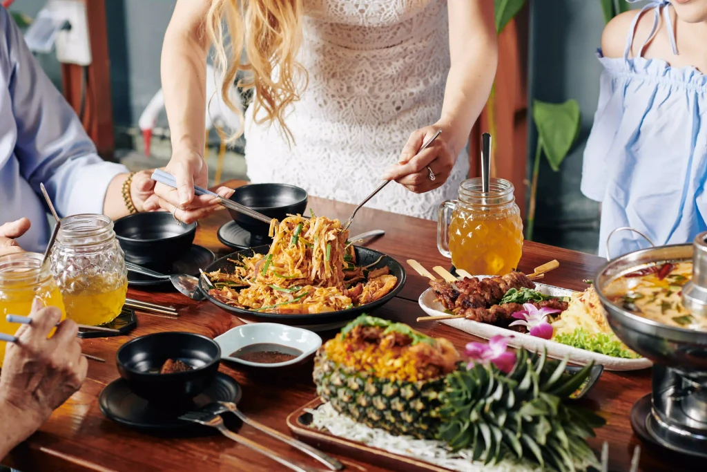 People enjoying Thai Pineapple Fried Rice